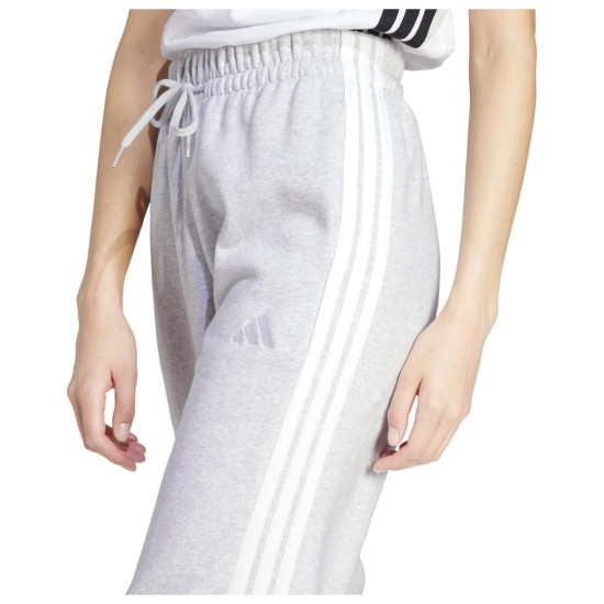Adidas Γυναικείο παντελόνι φόρμας Essentials 3-Stripes Fleece Loose-Fit Pants Adidas Γυναικείο παντελόνι φόρμας Essentials 3-Stripes Fleece Loose-Fit Pants